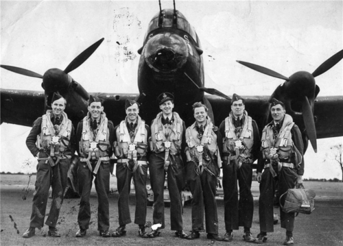 The crew of British Avro Lancaster bomber in front of his plane